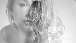 Stunning blonde Darina is showing her gorgeous boobs and shaved pussy  in black and white film